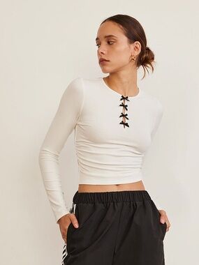 Commense Cream Long Sleeve Crop Top with Black Bow Trim